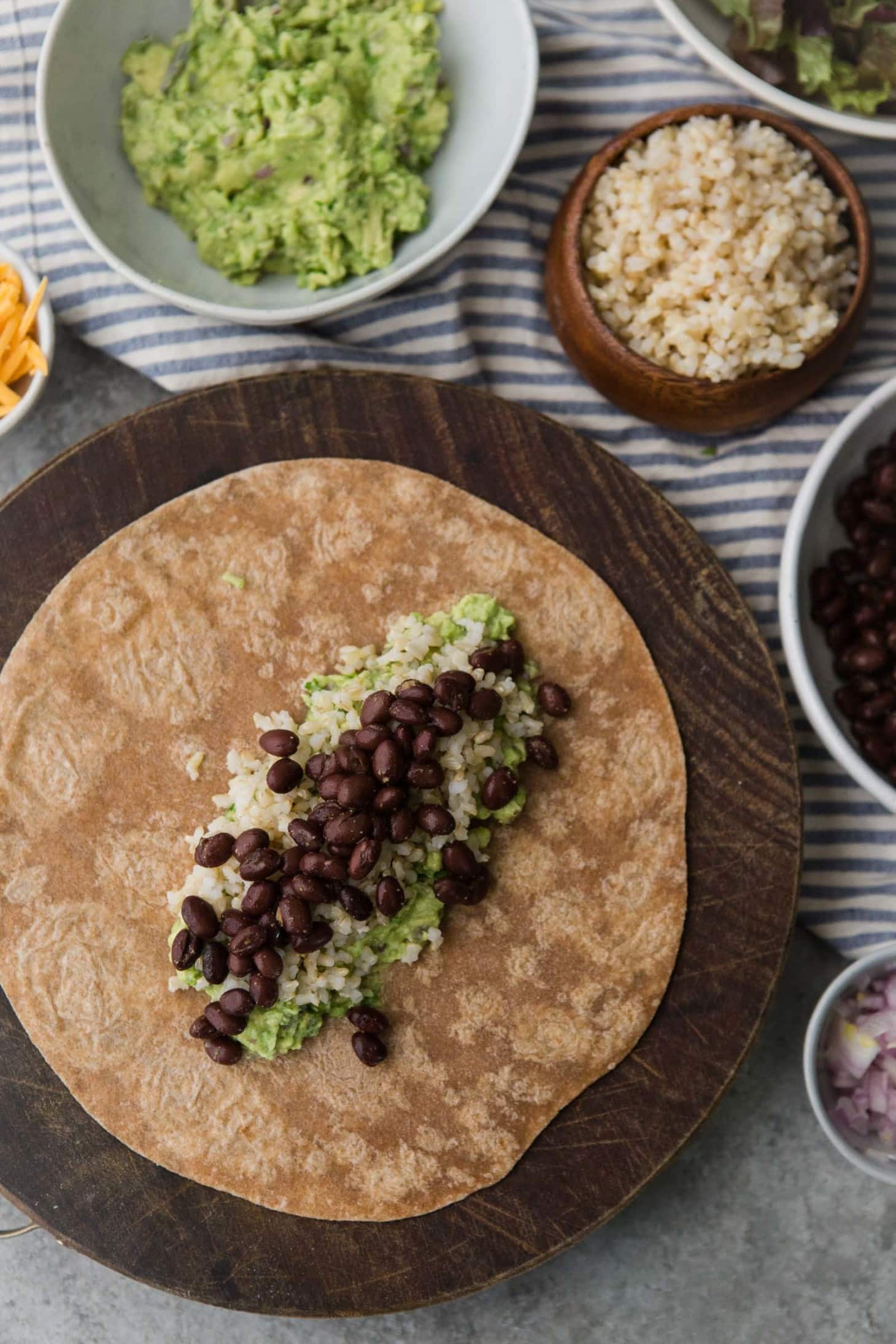 Black Bean Burrito with Guacamole and Brown Rice | @naturallyella