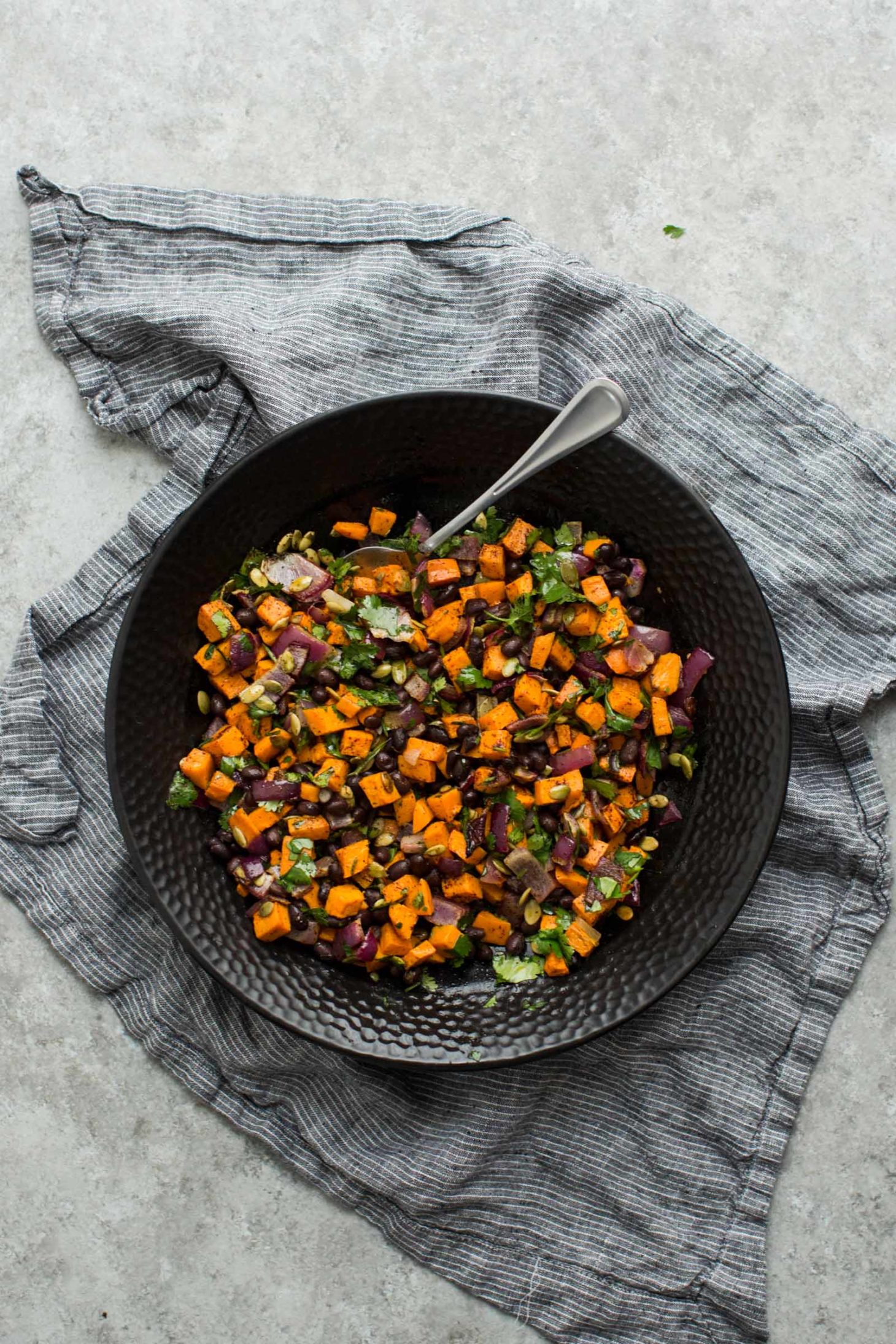 Black Bean Salad with Roasted Sweet Potatoes and Pepitas | @naturallyella