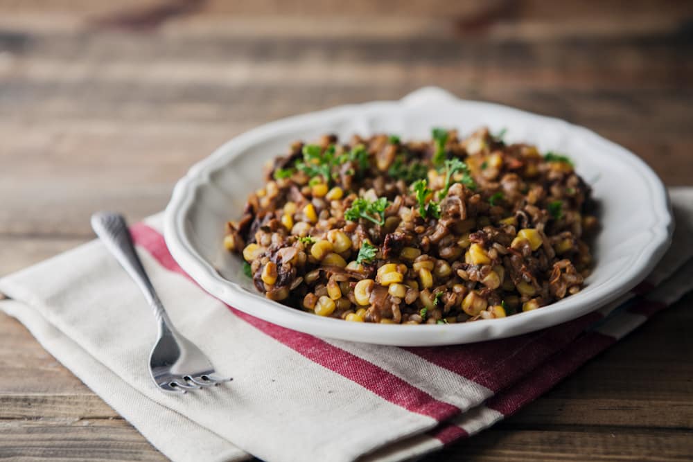 Sun Dried Tomato and Sweet Corn Farro Risotto- Sweet Corn Recipes | http://naturallyella.com