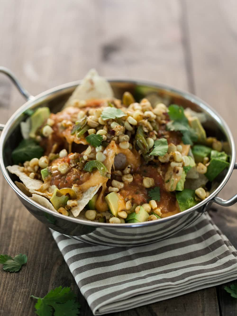 Nachos with Corn Relish, Roasted Tomato Salsa, and Avocado