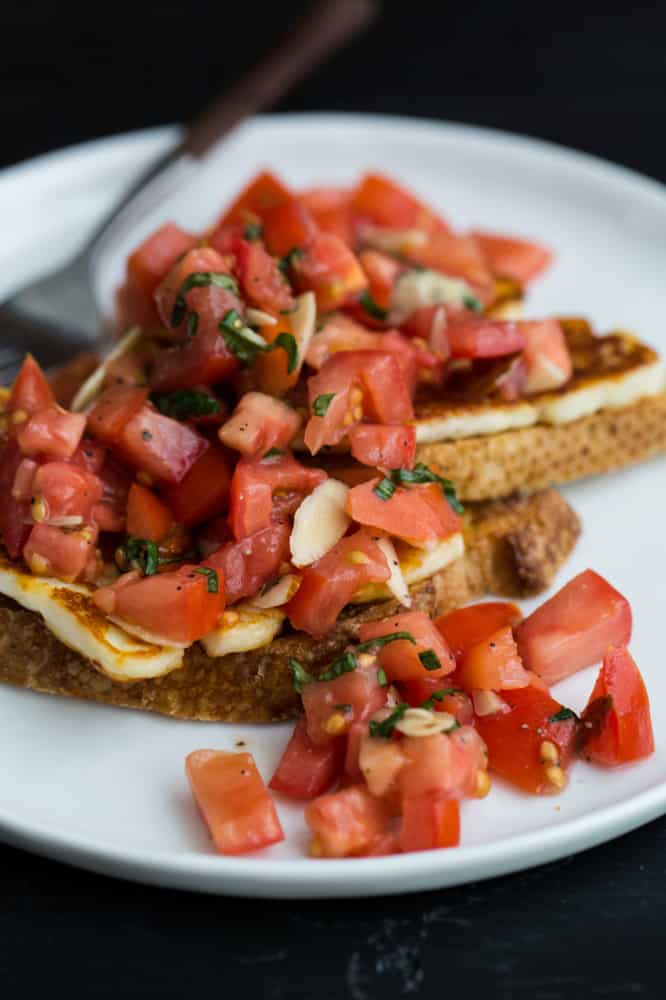 Fried Halloumi with Dry-Farmed Tomato Bruschetta | @naturallyella