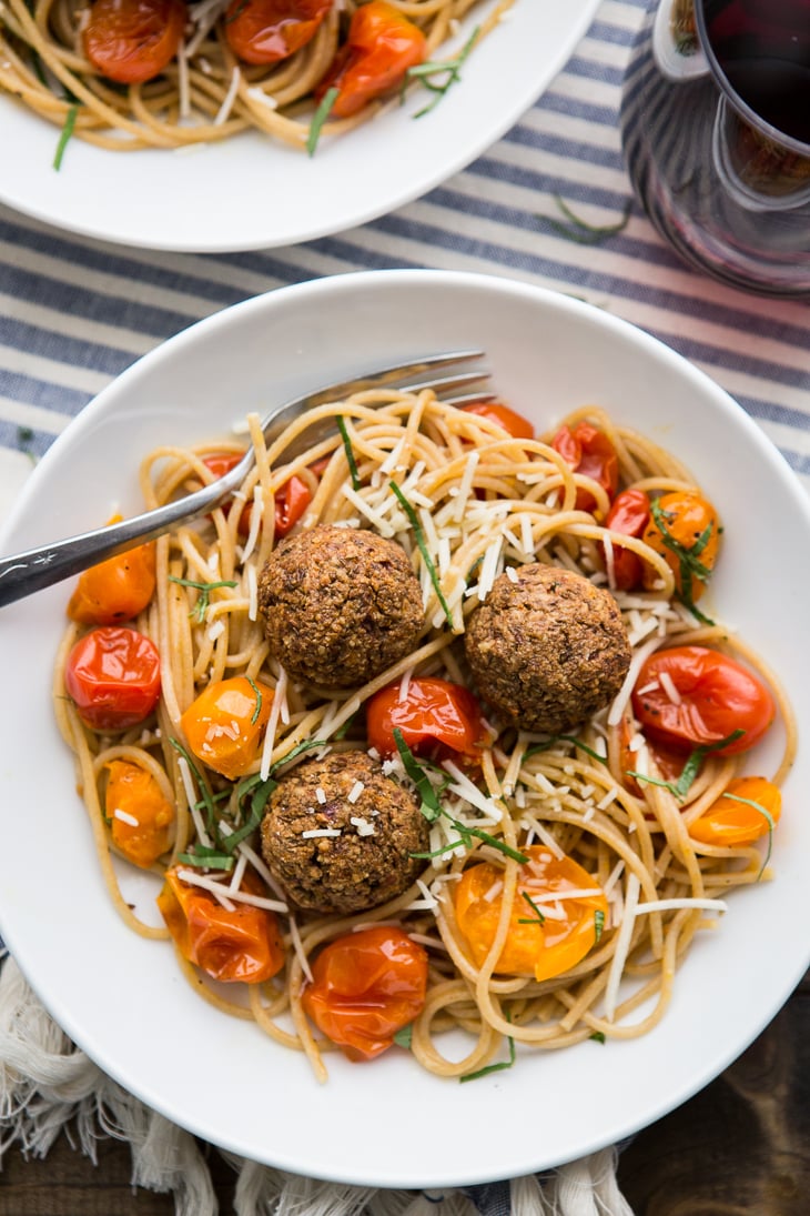 Lentil Meatballs with Burst Tomato Pasta | @naturallyella