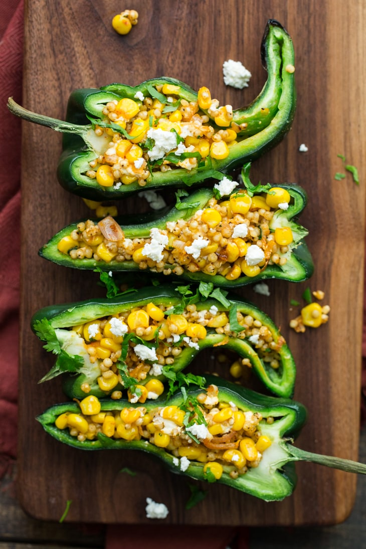 Sweet Corn Sorghum Stuffed Peppers | @naturallyella