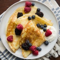 Einkorn Crepes with Fresh Berries and Creme Fraiche | http://naturallyella.com
