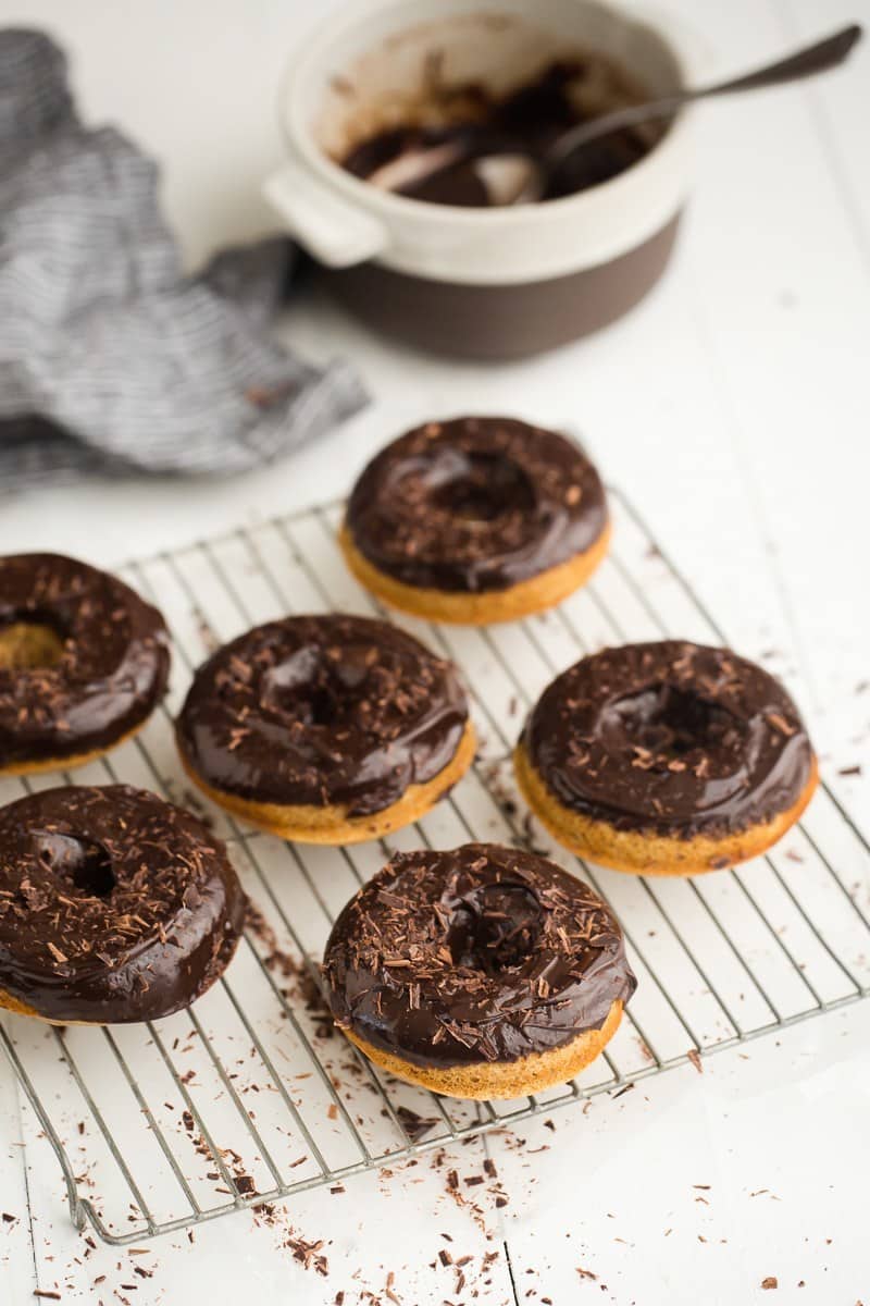 Buttermilk Spelt Baked Doughnuts with Chocolate Ganache Frosting | http://naturallyella.com