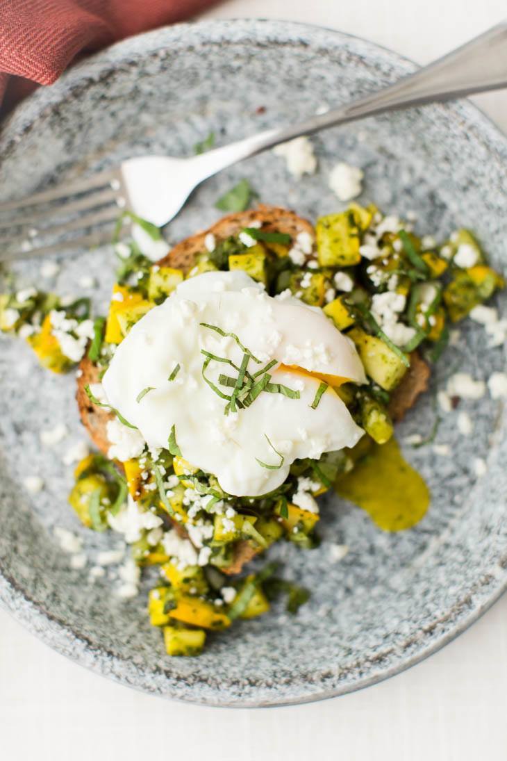 Pesto Summer Squash Bruschetta with Poached Eggs | http://naturallyella.com