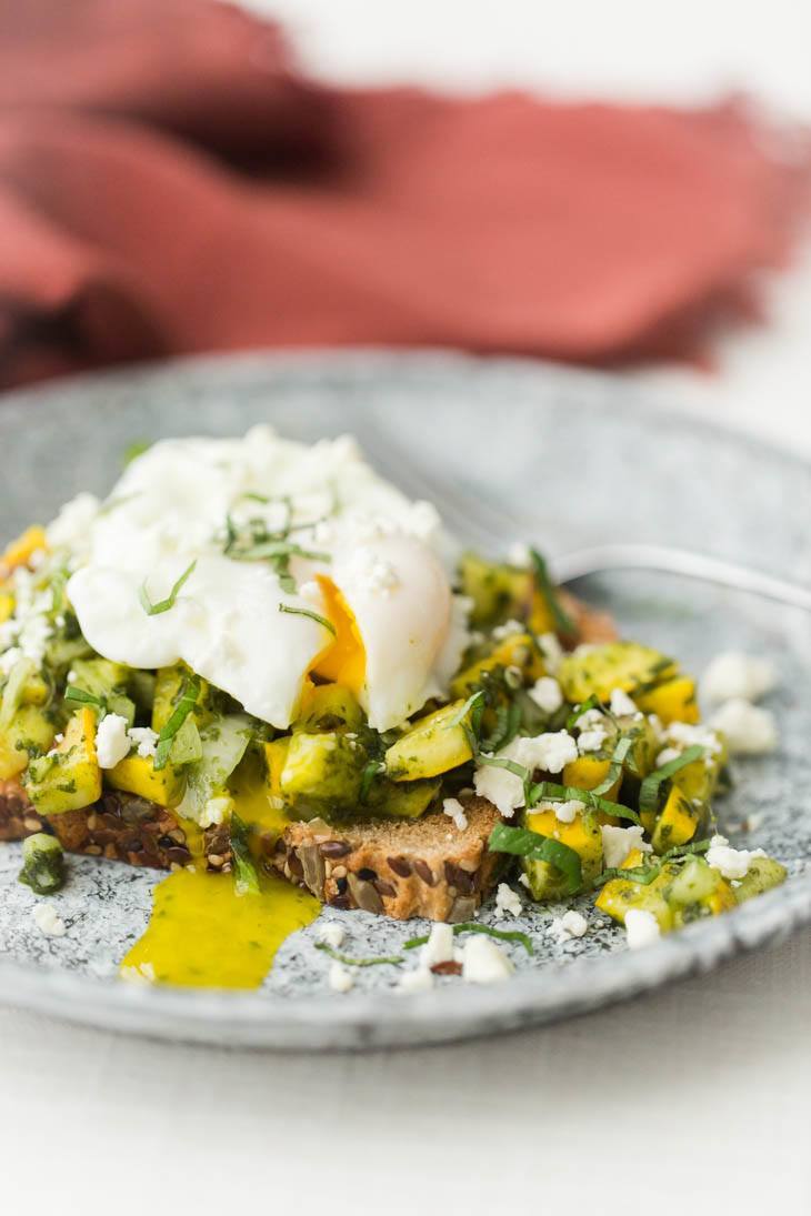 Grilled Pesto Summer Squash Bruschetta with Poached Eggs | http://naturallyella.com