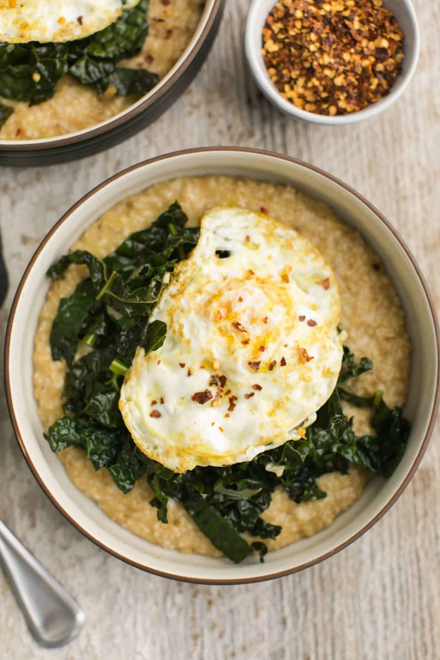 Savory Oatmeal with Garlicky Kale | @naturallyella