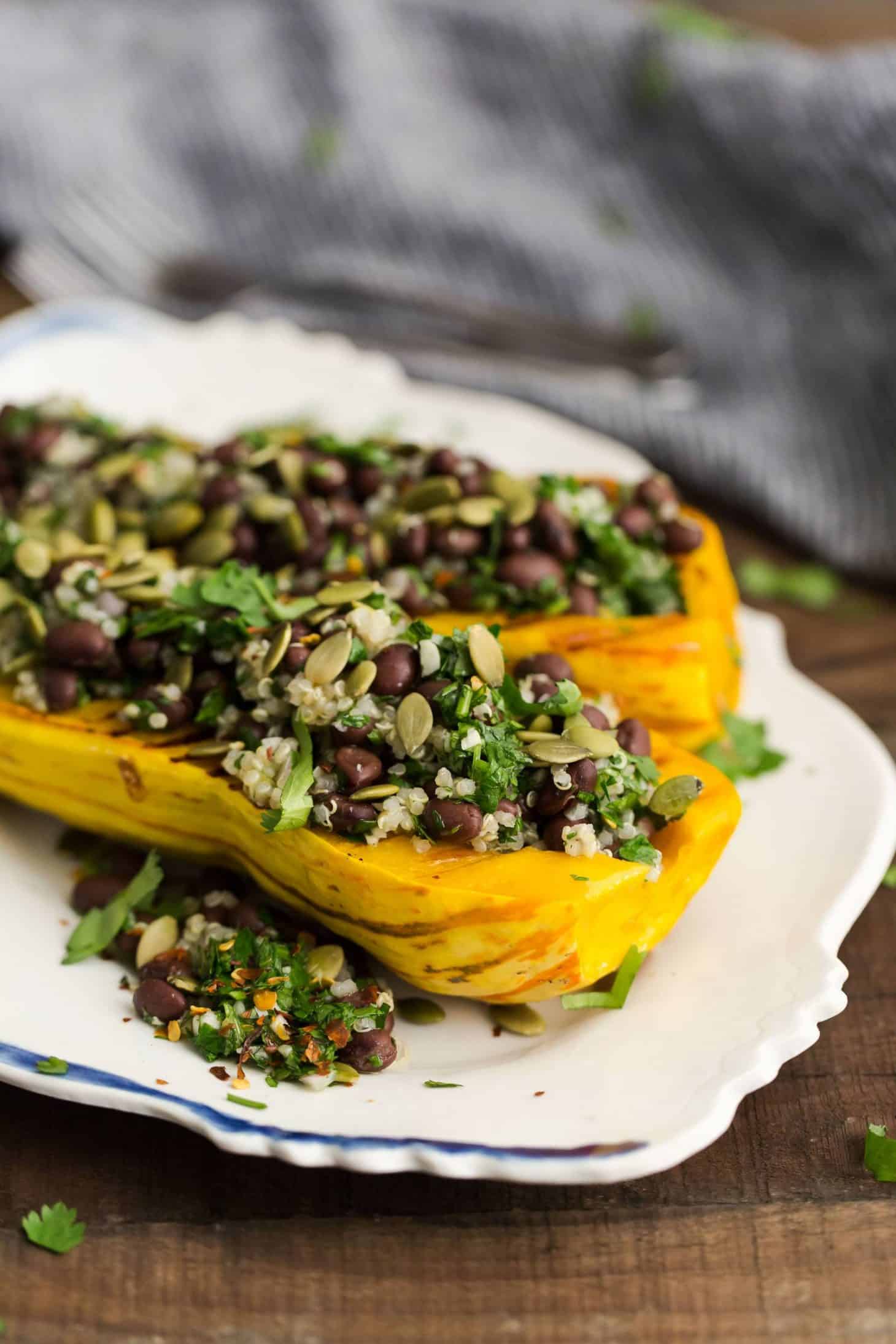 Stuffed Delicata with Chimichurri Black Beans and Quinoa | @naturallyella