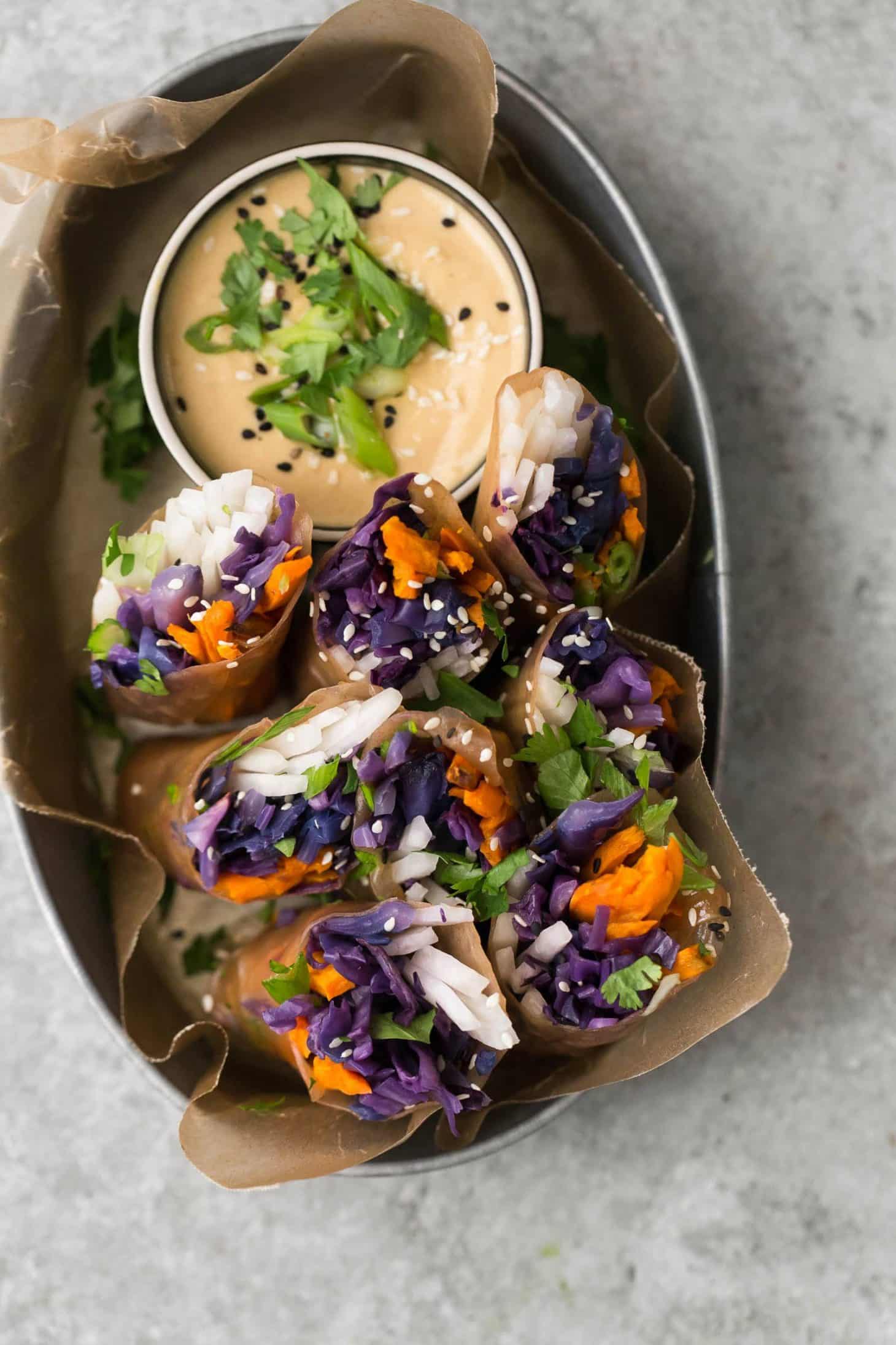 Roasted Cabbage Summer Rolls with Sweet Potatoes and Tahini Sauce | @naturallyella