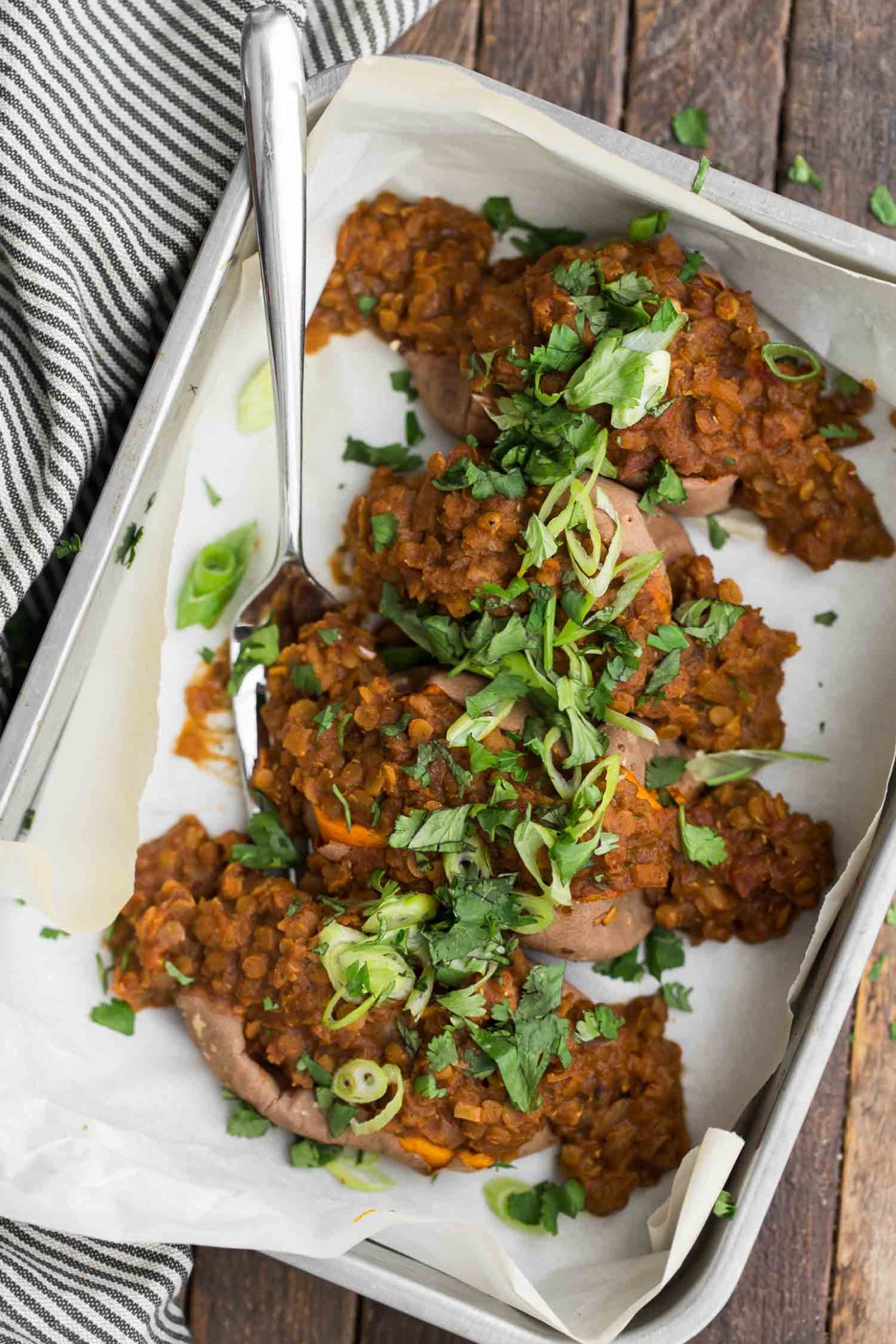 Chili Lentils over Sweet Potatoes | @naturallyella