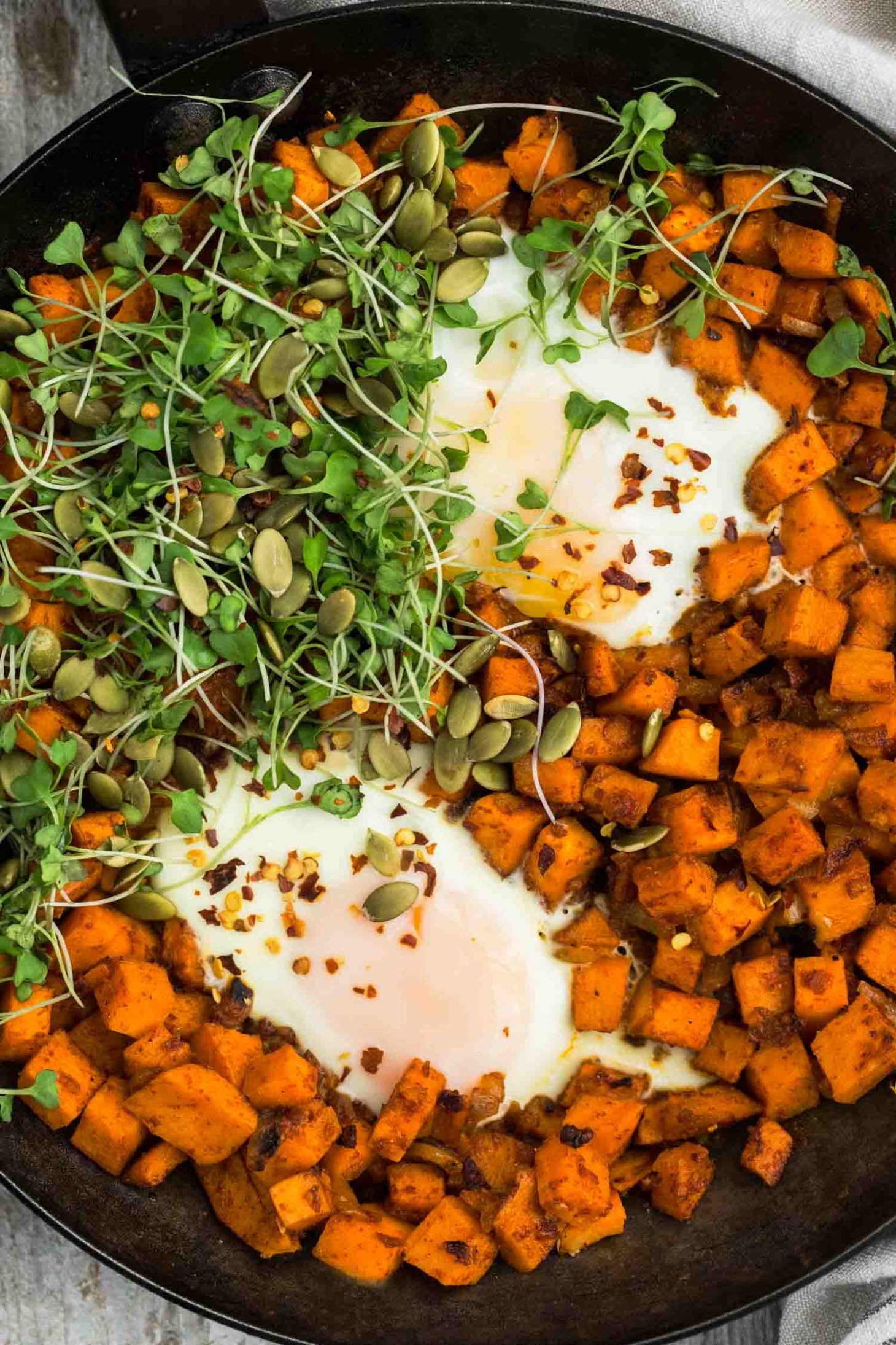 Sweet Potato Hash Egg Skillet with Micro-greens | @naturallyella