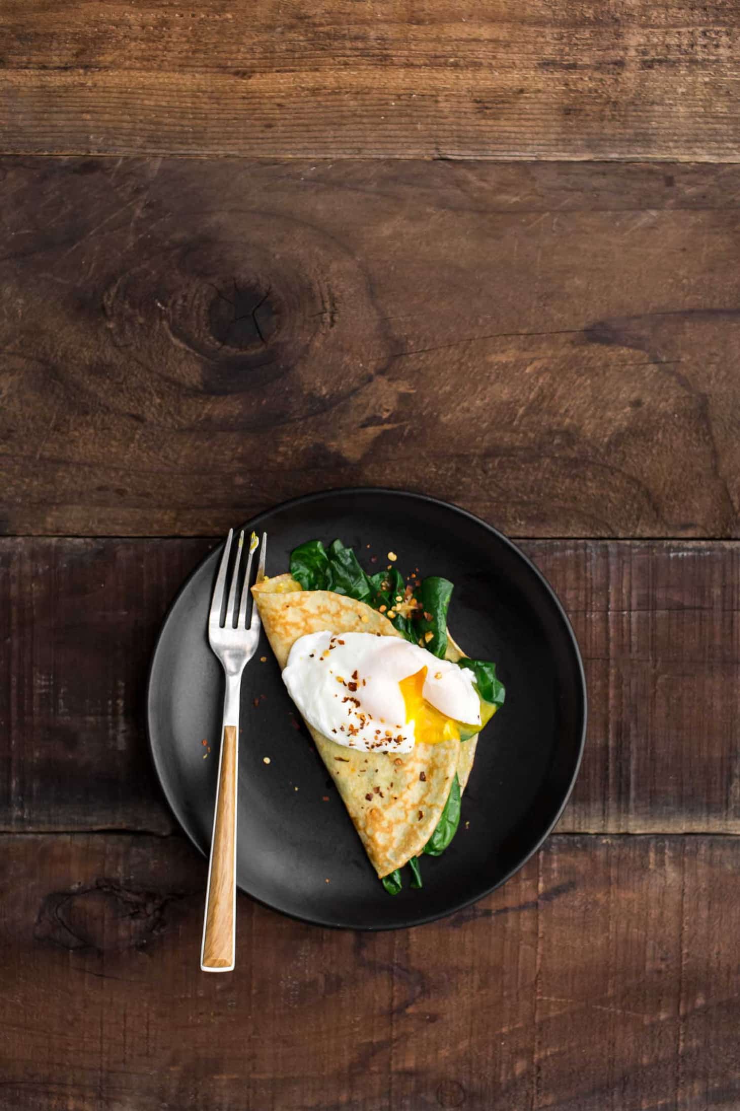 Garlicky Spinach Cornmeal Crepes with Poached Egg | Naturally Ella