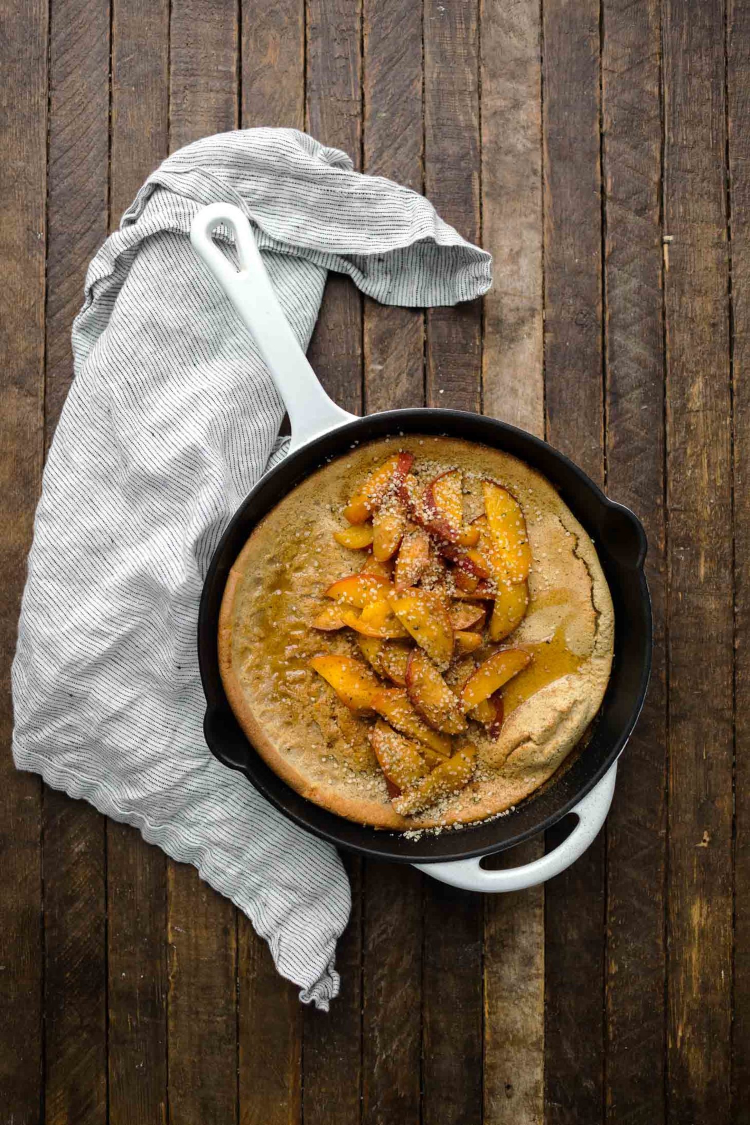 Multigrain Dutch Baby with Cinnamon Peaches | Naturally Ella