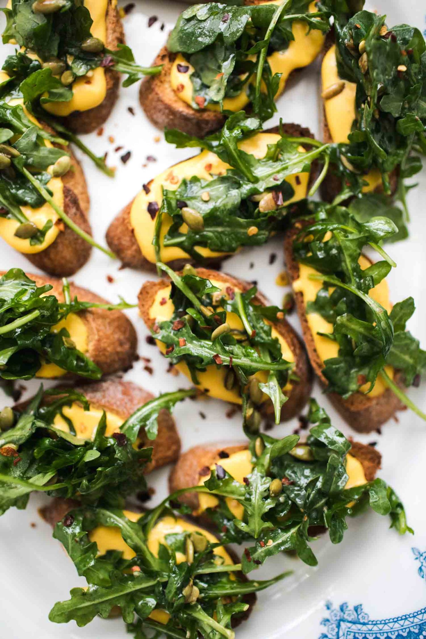 Pumpkin Ricotta Crostini with Arugula