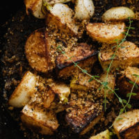 Close-up, overhead shot of pan-fried turnips sprinkle with breadcrumbs