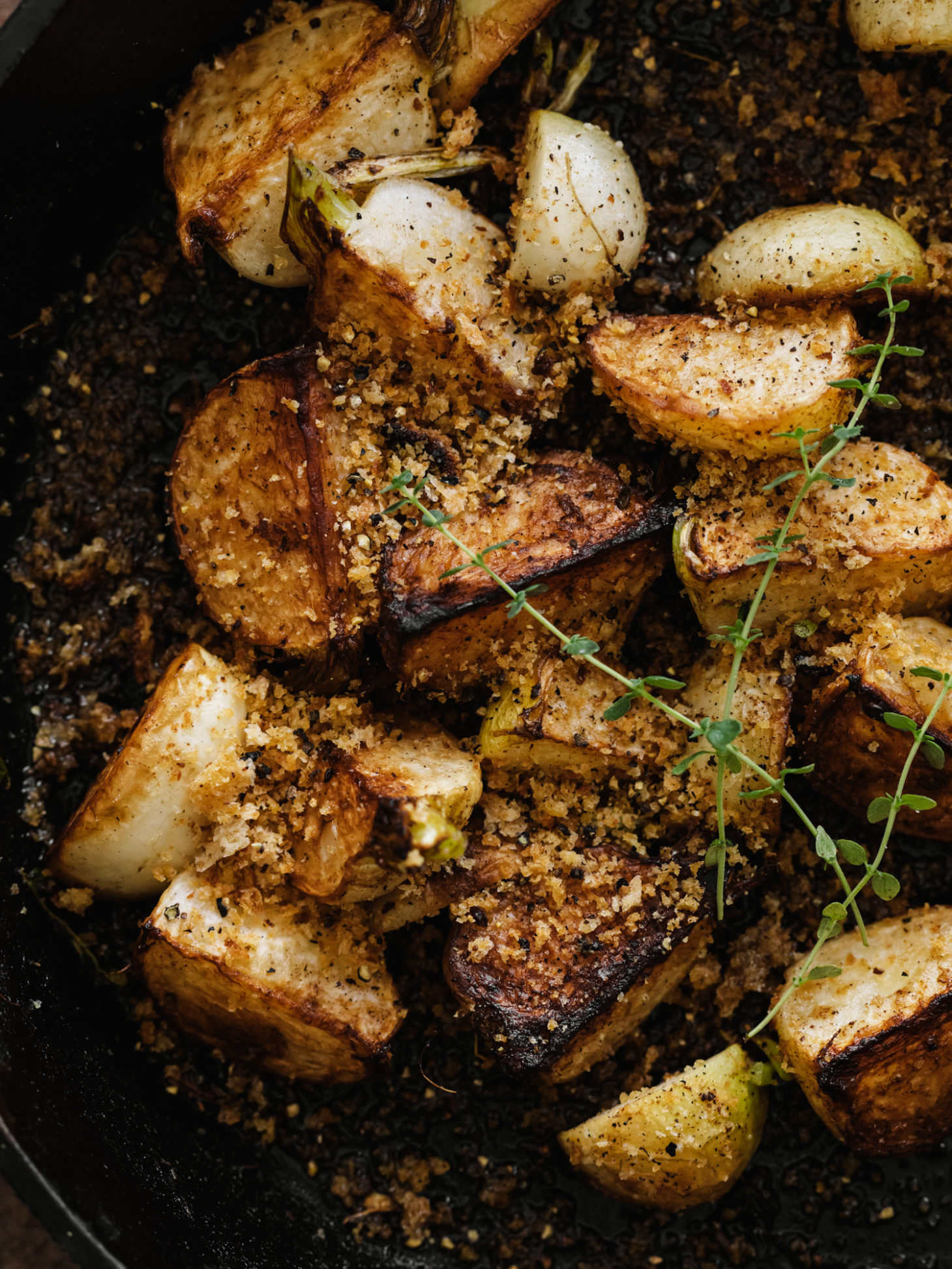 Close-up, overhead shot of pan-fried turnips sprinkle with breadcrumbs