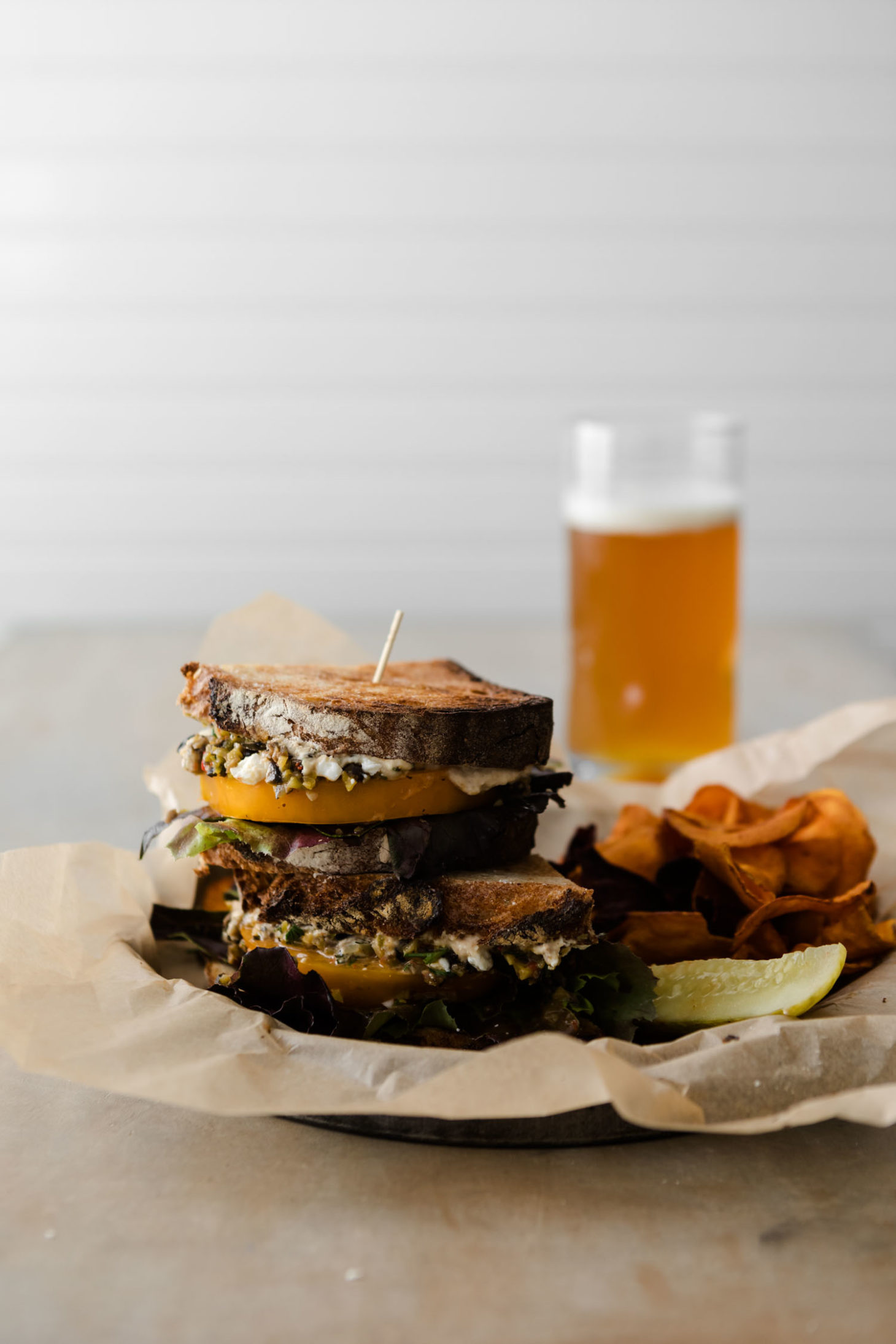 Tomato Sandwich with Olive Tapenade, Hummus, and Feta 