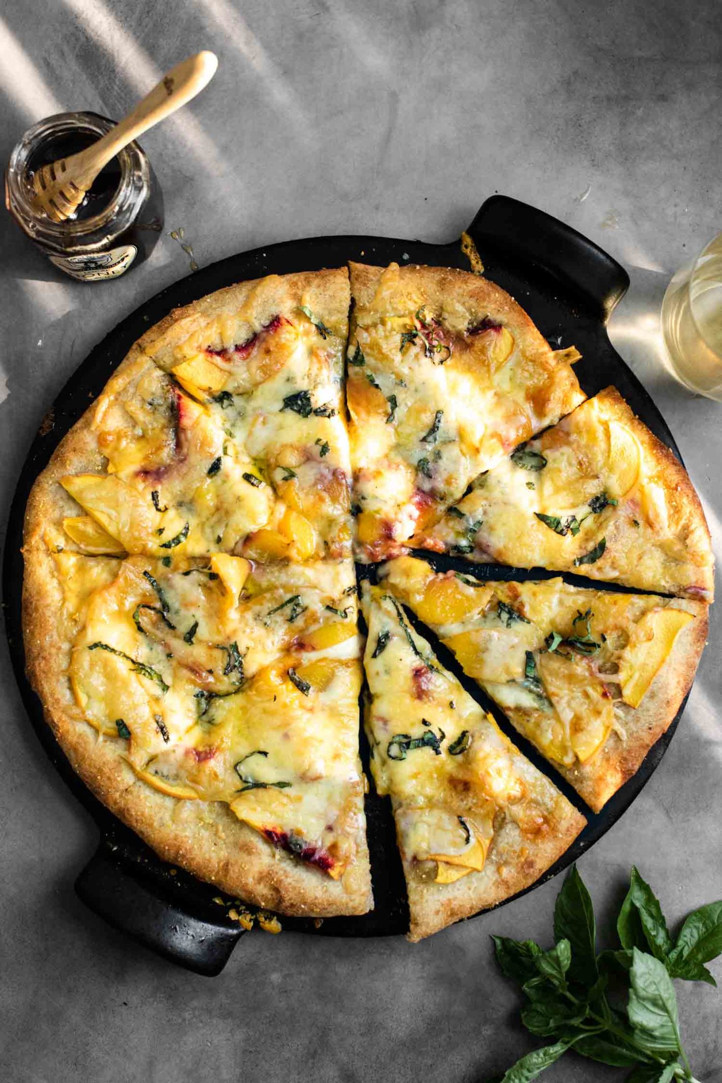 Overhead shot of Blue Cheese Peach Pizza with Honey