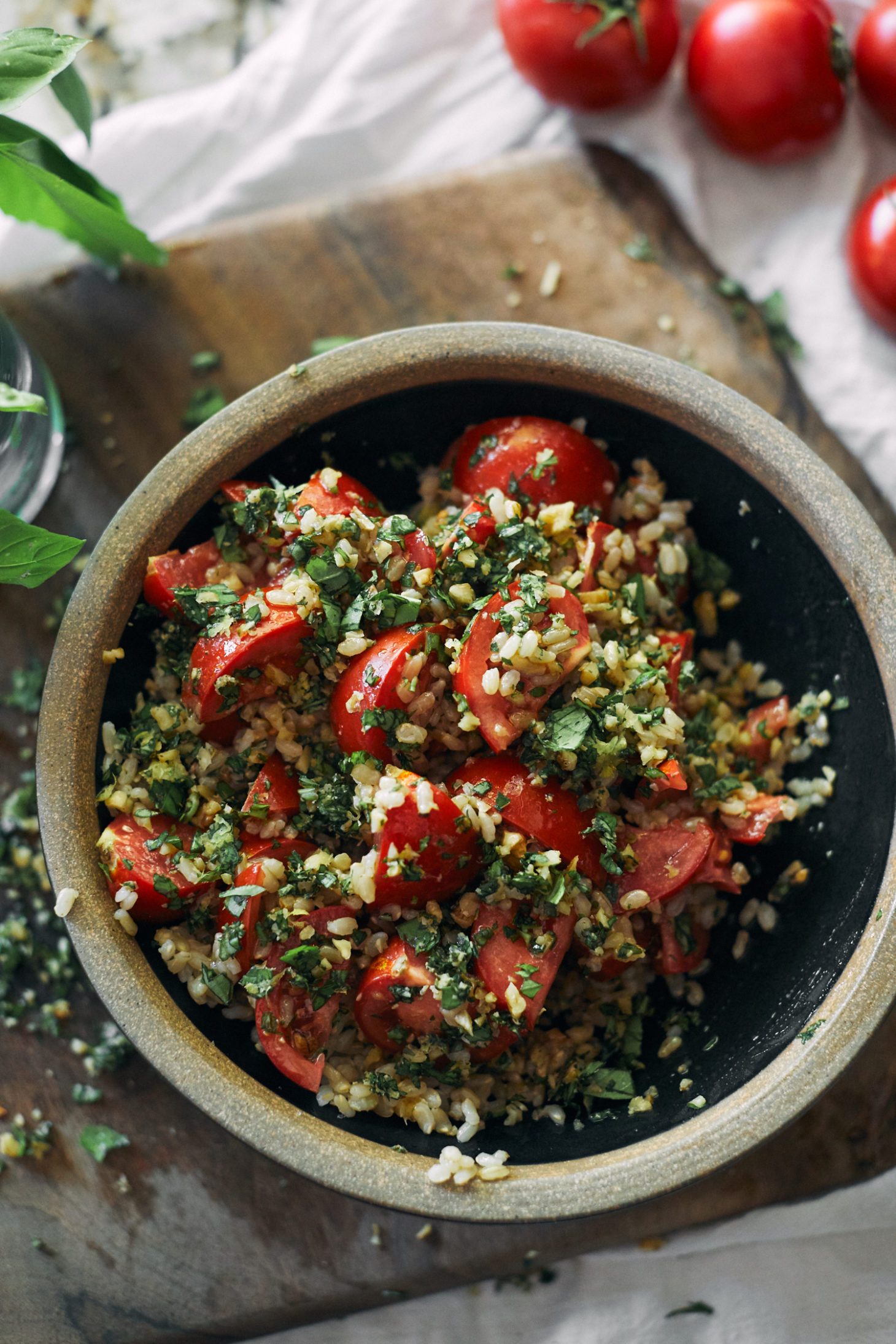 Tomatoes tossed with rice, herbs, walnuts, and chickpeas