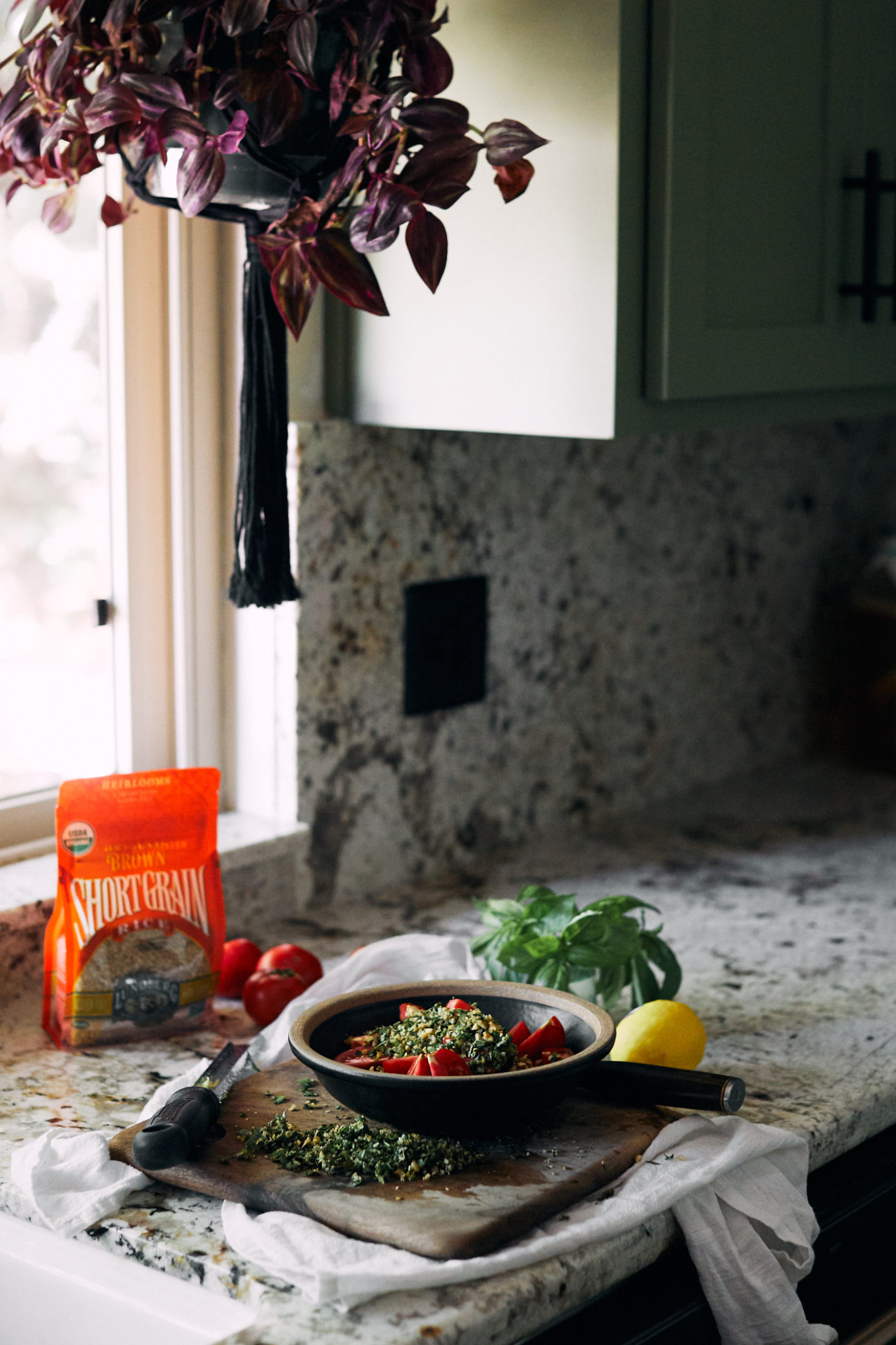 Salad being assembled in a kitchen