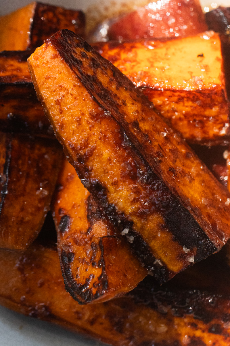 Close-up of grilled sweet potatoes with a soy-butter sauce