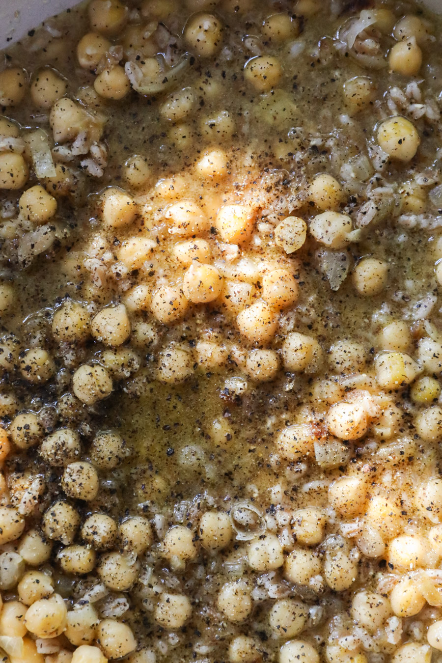 close-up of brothy chickpeas and emmer